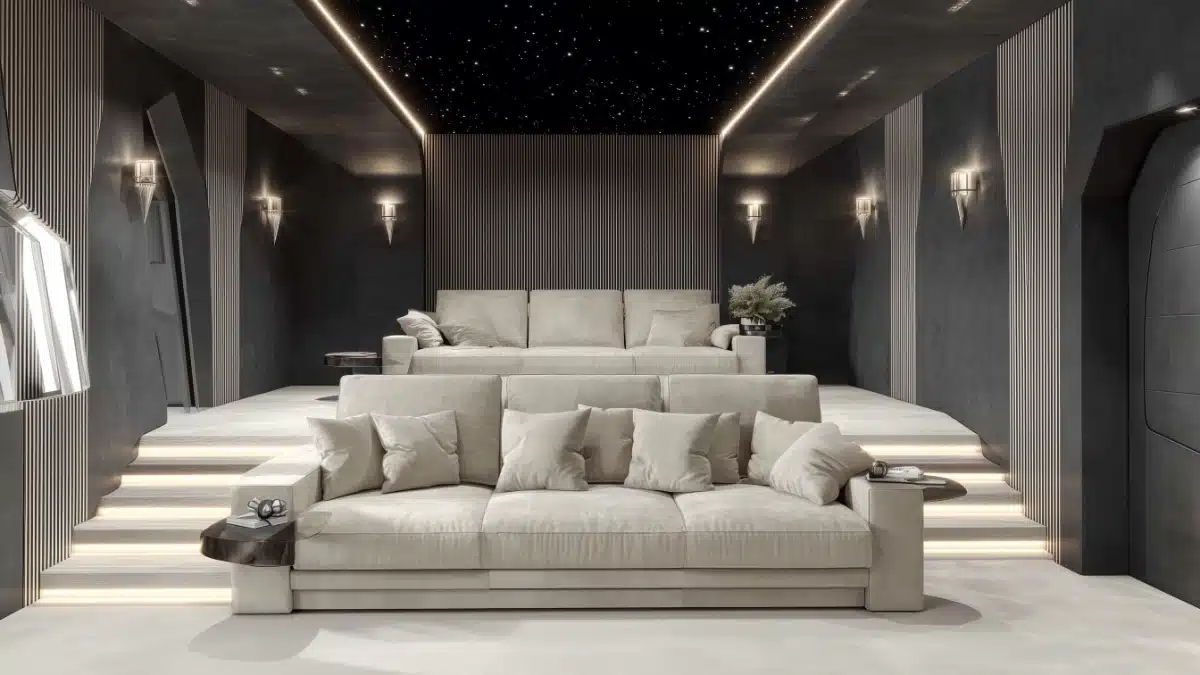 Poltrone e materiali opachi in una sala home cinema su misura